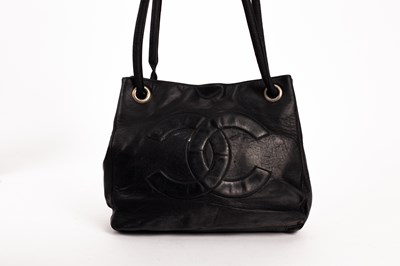 Lot 255 - A Chanel black leather tote bag