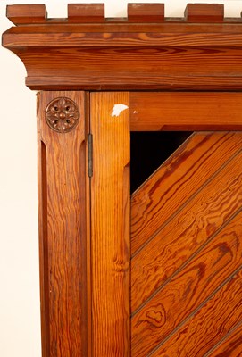 Lot 348 - An Aesthetic movement pitch pine triple wardrobe