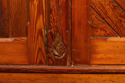 Lot 348 - An Aesthetic movement pitch pine triple wardrobe