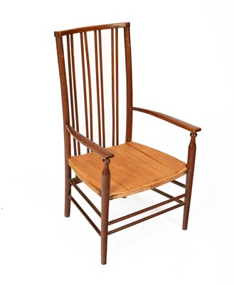 Lot 239 - An Arts & Crafts stick back nursing chair