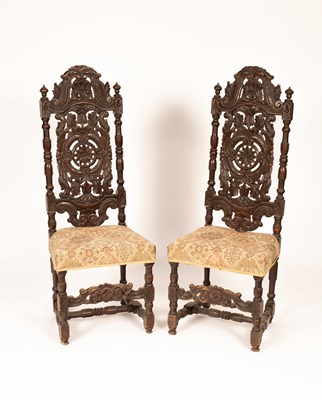 Lot 410 - A pair of 19th Century walnut Carolean revival carved hall or throne chair