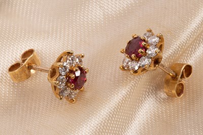 Lot 73 - A pair of 18ct yellow gold diamond and ruby cluster earrings