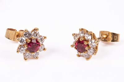 Lot 73 - A pair of 18ct yellow gold diamond and ruby cluster earrings